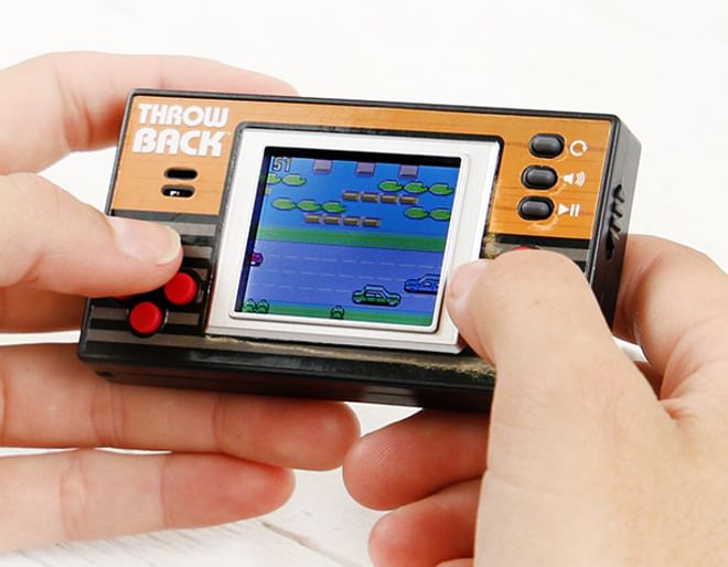Throwback pocket video game shop console